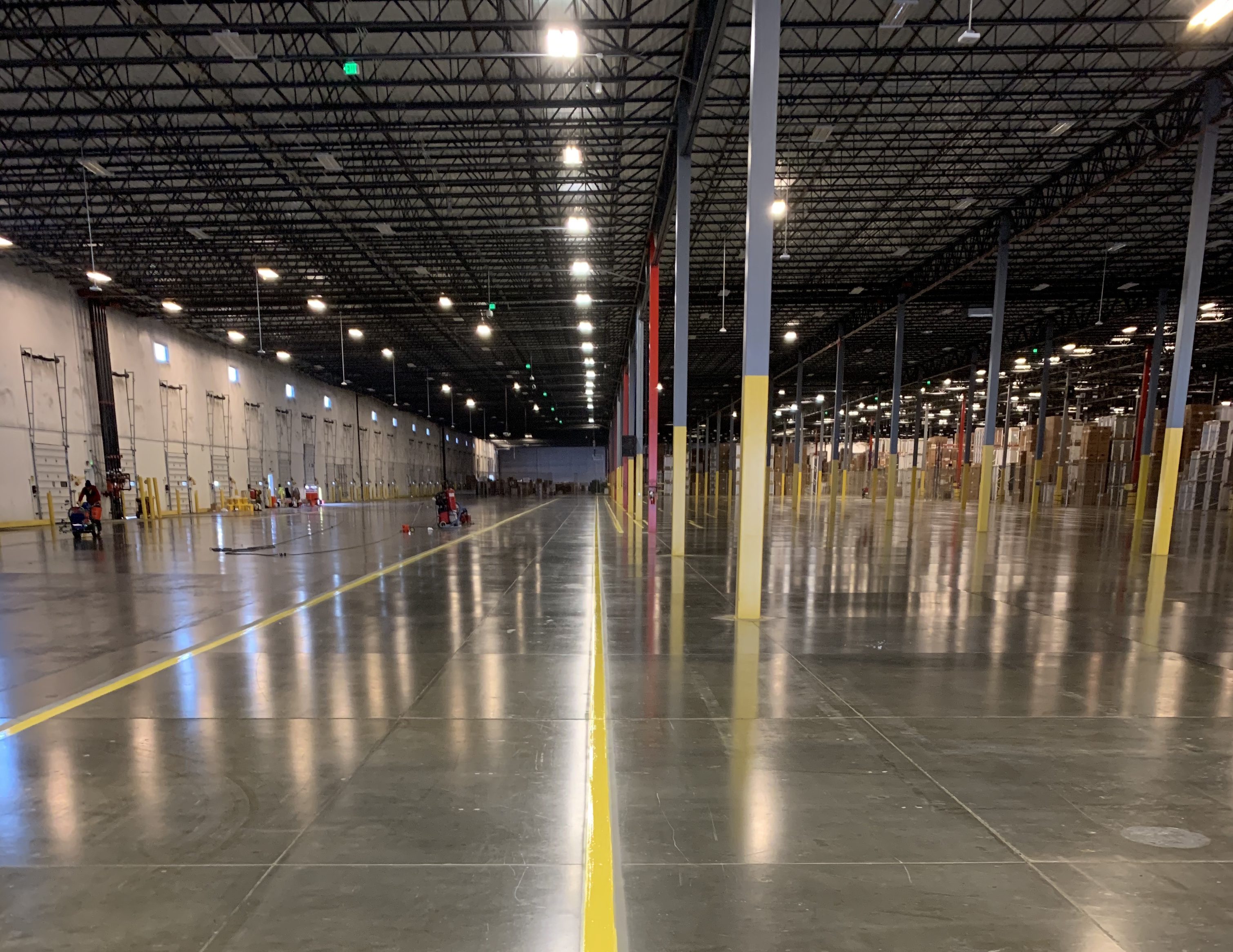 Denver, Colorado. Colorado Concrete Repair line striping in warehouse